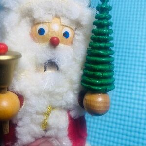 Festive Santa Nutcracker with Green Tree